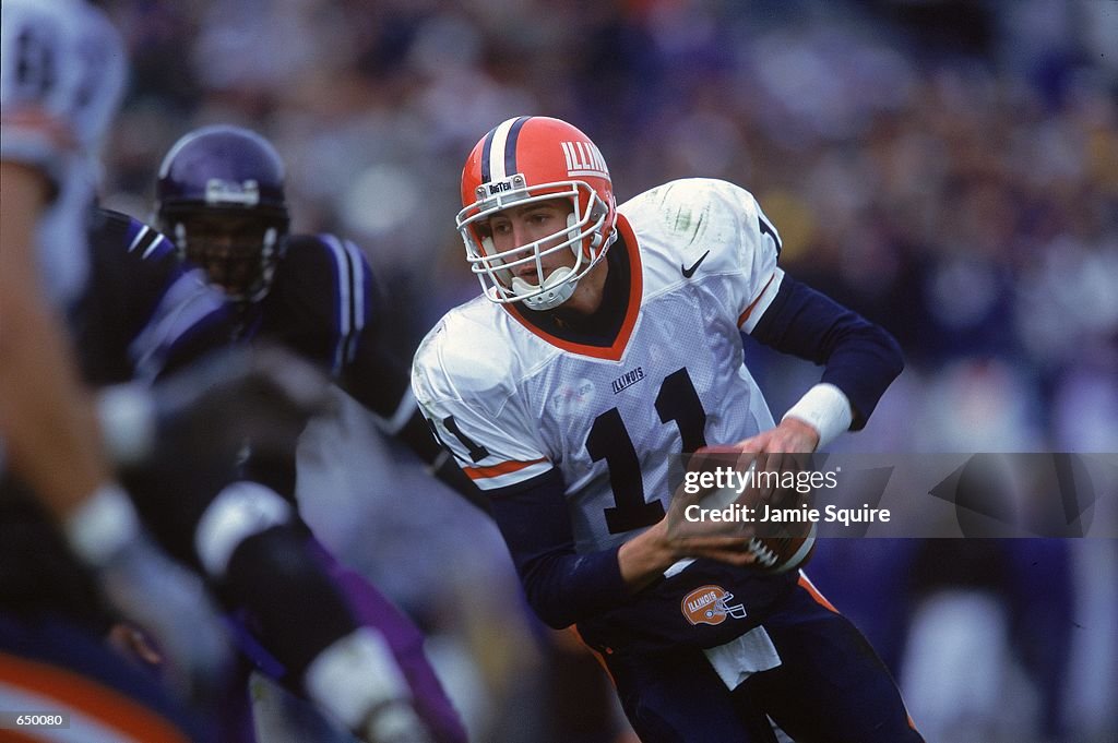 Dustin Ward Ranger Dustin Ward of the Illinois Fighting Illini moves with the ballduring ...