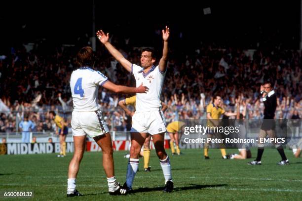 West Ham United's Trevor Brooking celebrates victory with teammate Billy Bonds