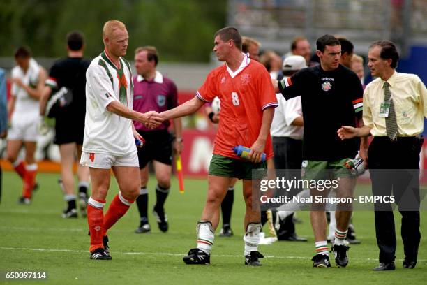 Holland's Ronald Koeman consoles Ireland's Roy Keane