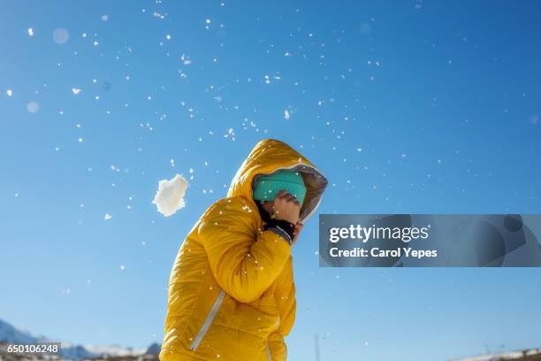 young teen enjoying snow - diversión stockfoto's en -beelden