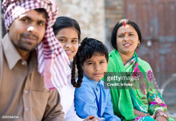 indian family - turban family stock pictures, royalty-free photos & images