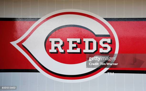 Cincinnati Reds logo is seen in the dugout during the spring training game between the Cincinnati Reds and the Los Angeles Angels at Goodyear...