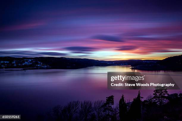 sunset over oscarsborg, drobak, norway - buskerud stock pictures, royalty-free photos & images