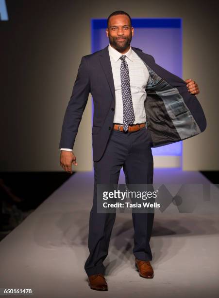 Former NFL player Robert Griffith walks the runway in Alba at the Fashion Setters Gala at the Beverly Wilshire Four Seasons Hotel on March 8, 2017 in...