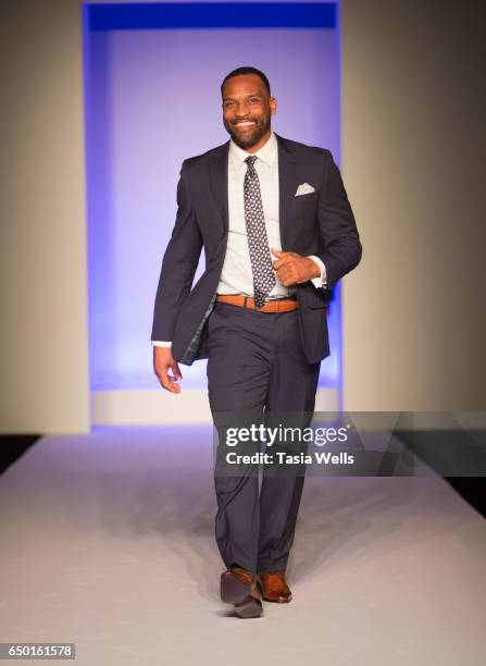 Former NFL player Robert Griffith walks the runway in Alba at the Fashion Setters Gala at the Beverly Wilshire Four Seasons Hotel on March 8, 2017 in...