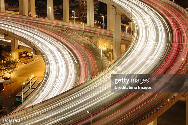 night view of shanghai nanpu bridge - penetrating stock pictures, royalty-free photos & images