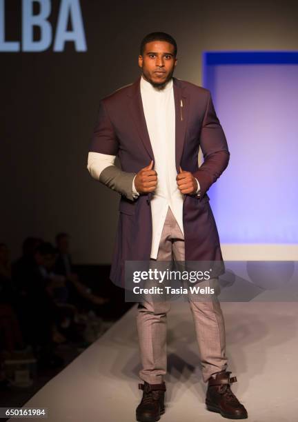 Player Bobby Wagner walks the runway in Alba at the Fashion Setters Gala at the Beverly Wilshire Four Seasons Hotel on March 8, 2017 in Beverly...