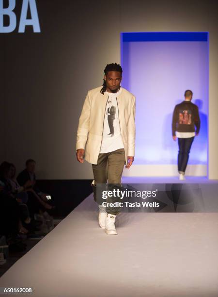 Player Bradley Roby walks the runway in Alba at the Fashion Setters Gala at the Beverly Wilshire Four Seasons Hotel on March 8, 2017 in Beverly...