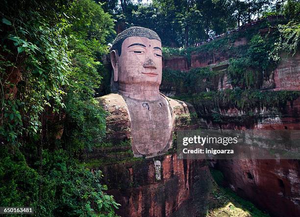 giant buddha statue, leshan, sichuan, china - tang dynasty stock pictures, royalty-free photos & images