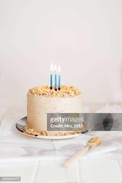 birthday cake with three candles - birthday cake stock pictures, royalty-free photos & images