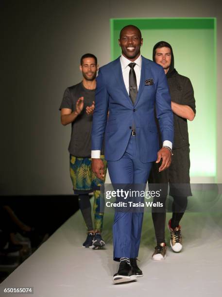 Former NFL player and sportswear designer Terrell Owens walks the runway at the Fashion Setters Gala at the Beverly Wilshire Four Seasons Hotel on...