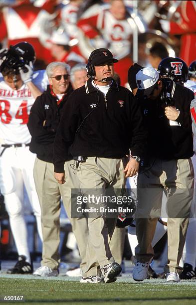 Head Coach Mike Leach of the Texas Tech Red Raiders watches the action from the sidelines during the game against the Oklahoma Sooners at the...