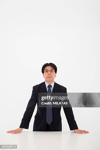 japanese man wearing a suit - president desk stock pictures, royalty-free photos & images