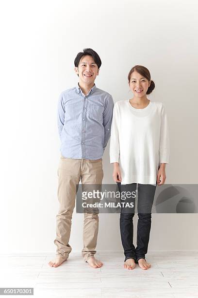 japanese a couple of newlywed - khaki trousers stock pictures, royalty-free photos & images
