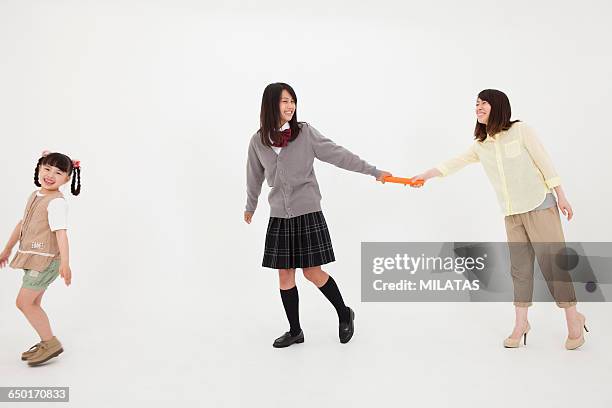 three japanese sisters to walk side by side - family relay stock pictures, royalty-free photos & images