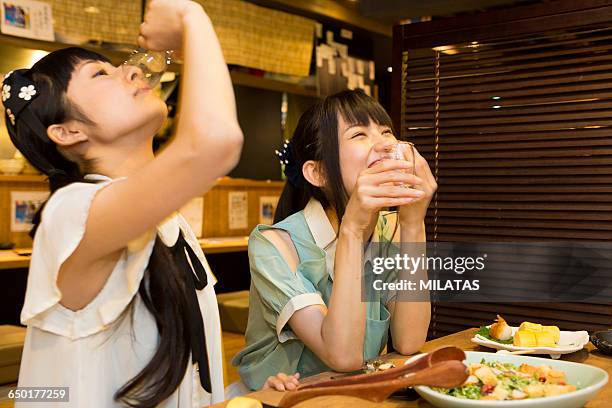 japanese young people who enjoy a drinking party - cup 2015 season launch stock pictures, royalty-free photos & images