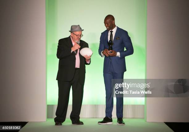 Former NFL player and sportswear designer Terrell Owens receives the Fashion Setters award onstage at the Fashion Setters Gala at the Beverly...