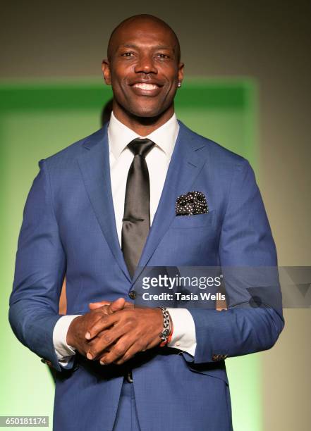 Former NFL player and sportswear designer Terrell Owens walks the runway at the Fashion Setters Gala at the Beverly Wilshire Four Seasons Hotel on...