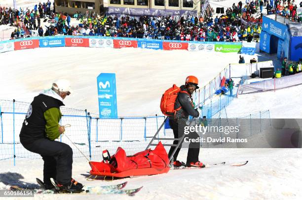 Evgeniy Gedrovich of Russia is taken away on a stretcher during the Men's Dual Moguls round of 16 on day two of the FIS Freestyle Ski and Snowboard...