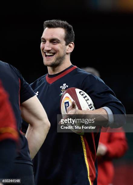 Wales player Sam Warburton enjoys a joke with a team mate during Wales captain's run ahead of their RBS Six Nations match against Ireland at...