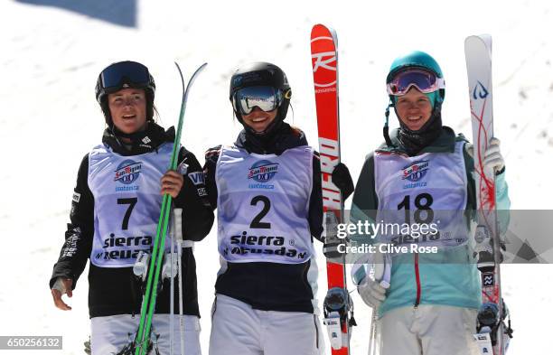 Perrine Laffont of France celebrates winning the gold medal with silver medallist Yulia Galysheva of Kazakhstan and bronze medallist Jaelin Kauf of...