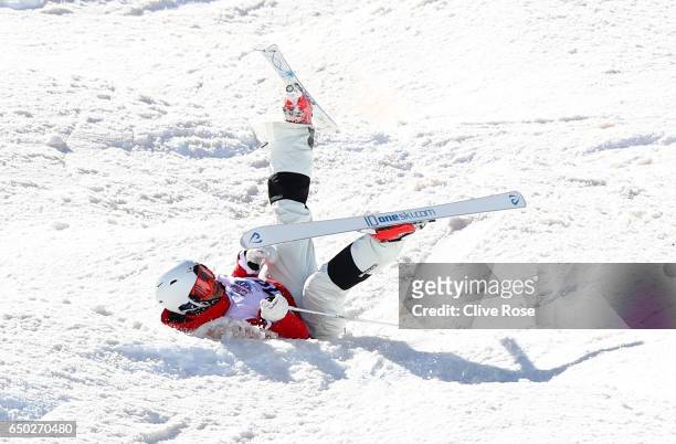Ikuma Horishima of Japan crashes before going on to win the gold medal in the Men's Dual Moguls on day two of the FIS Freestyle Ski and Snowboard...