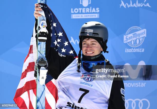 Bradley Wilson of the United States celebrates winning the silver medal in the Men's Dual Moguls on day two of the FIS Freestyle Ski and Snowboard...