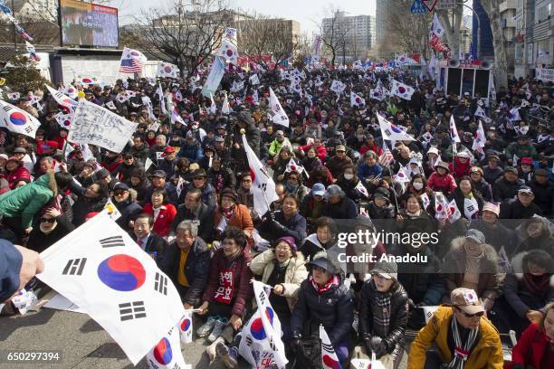 Supporters of South Korean President, Park Geun-hye take part in a rally in front of the Korean Constitutional Court before the impeachment verdict...