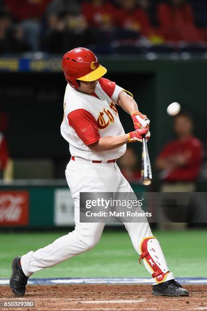 Catcher Weiqiang Meng of China at bat in the bottom of the seventh inning during the World Baseball Classic Pool B Game Four between Australia and...