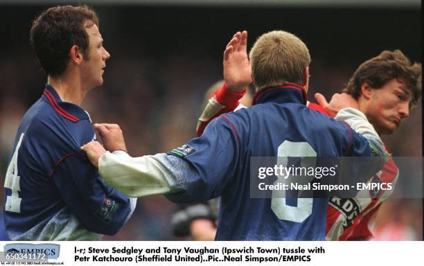 L-r; Steve Sedgley and Tony Vaughan tussle with Petr Katchouro (Sheffield United