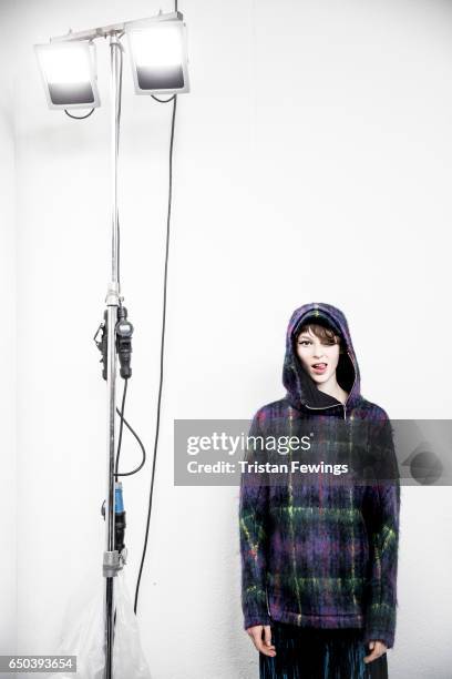 Model is seen backstage ahead of the Wunderkind show during Milan Fashion Week Fall/Winter 2017/18 on February 22, 2017 in Milan, Italy.