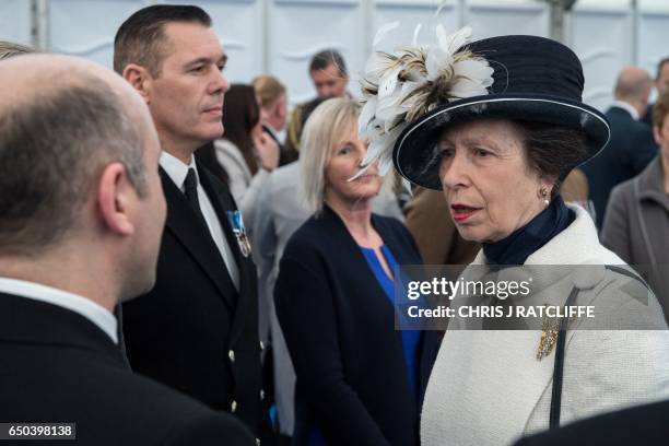 Britain's Princess Anne, Princess Royal speaks with British military personnel, at a reception on Horse Guards Parade in central London on March 9...