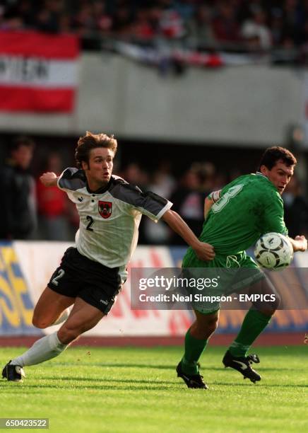 Harald Cerny of Austria turns away from Sergei Gourenko of Belarus