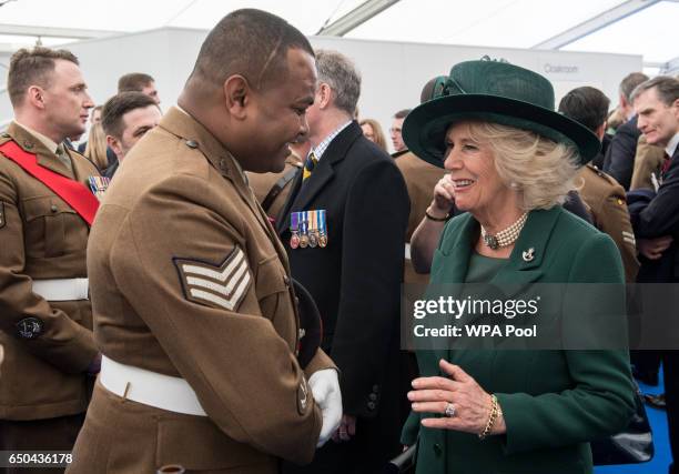 Camilla, Duchess of Cornwall speaks with British military personnel at a reception following the unveiling of the new memorial to members of the...