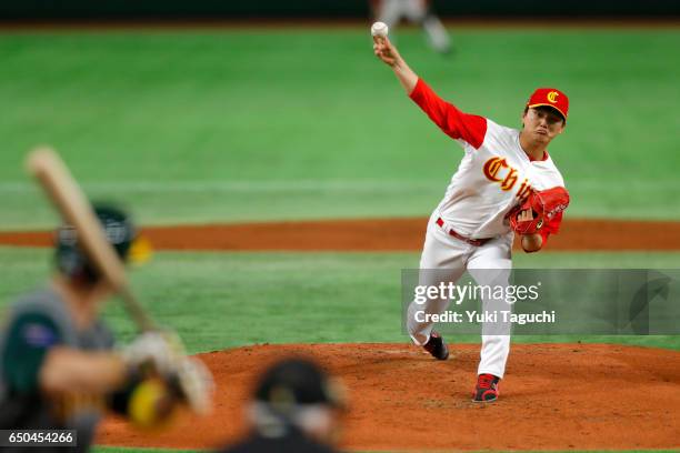 Kwon Ju of Team China pitches in second inning during Game 4 of Pool B against Team Australia at the Tokyo Dome on Thursday, March 9, 2017 in Tokyo,...