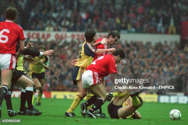 Arsenal's Anders Limpar and Nigel Winterburn become involved in a fight with Manchester United's Brian McClair and Denis Irwin