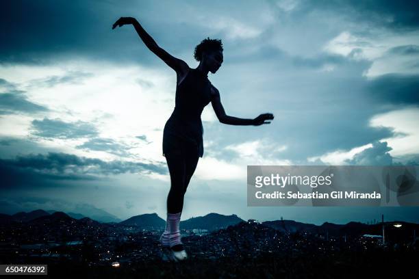 Tuany Nascimento dancing on tip toe in her community, Morro do Adeus, Complexo do Alemão, Río de Janeiro.