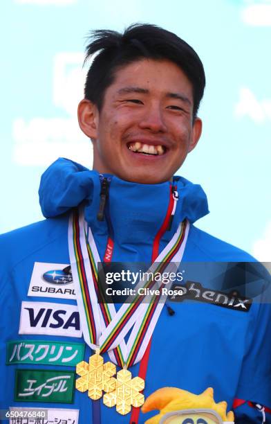 Ikuma Horishima of Japan poses with his two gold medals after the Men's Dual Moguls on day two of the FIS Freestyle Ski and Snowboard World...