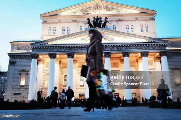 Woman walks by the Bolshoi Theatre in Moscow on March 9, 2017 in Moscow, Russia. Relations between the United States and Russia are at their lowest...