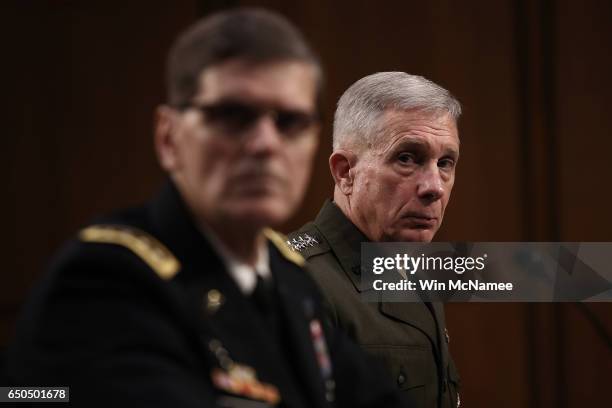 Lieutenant Generall Raymond Thomas , Commander of U.S. Special Operations Command, listens as U.S. Central Command Commander Army Gen. Joseph Votel...