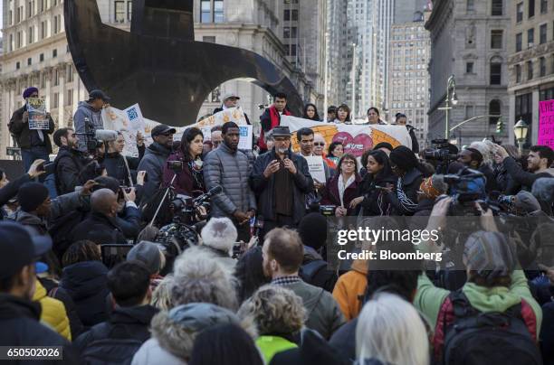 Immigration activist Ravi Ragbir, center, speaks at a rally after a check-in with Immigration and Customs Enforcement at the Jacob K. Javits Federal...