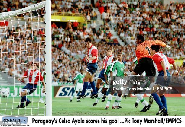 Paraguay's Celso Ayala heads home the opening goal