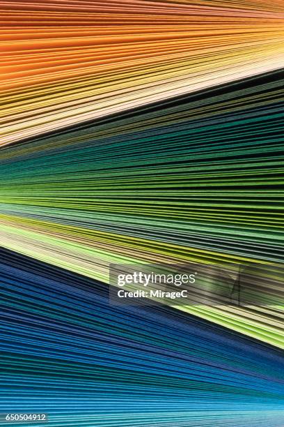 colorful book pages stacking - book abstract stock-fotos und bilder