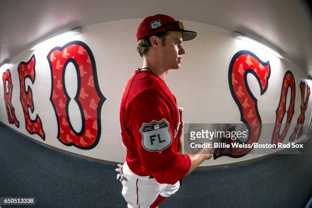 Brock Holt of the Boston Red Sox walks through the tunnel before a Spring Training game against Team USA on March 9, 2017 at Fenway South in Fort...