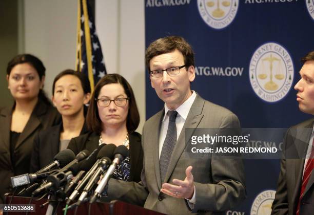 Washington State Attorney General Bob Ferguson gives a press conference asking a federal judge to block US President Donald Trump's revised travel...