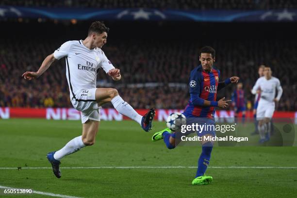 Thomas Meunier of PSG battles Neymar of Barcelona during the UEFA Champions League Round of 16 second leg match between FC Barcelona and Paris...