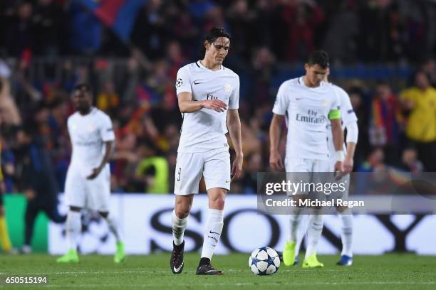 Edinson Cavani and Thiago Silva of PSG look dejected after Barcelona's 6th goal during the UEFA Champions League Round of 16 second leg match between...
