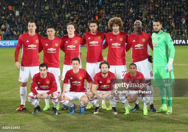 The Manchester United team lines up ahead of the UEFA Europa League Round of 16 first leg match between FK Rostov and Manchester United at Olimp-2 on...