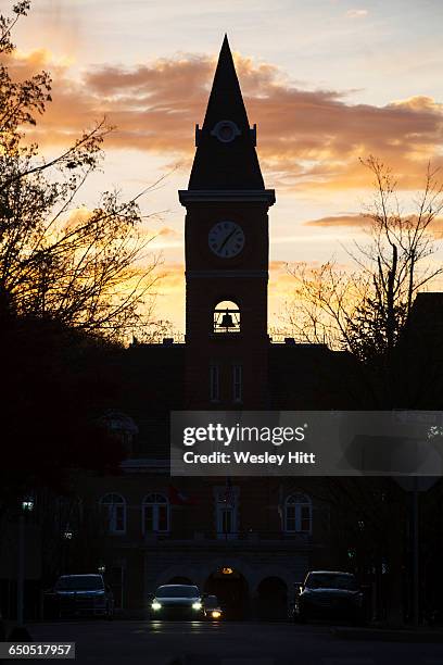 bell and clock tower at the county courthouse - fayetteville arkansas stockfoto's en -beelden