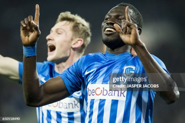 Genk's Omar Colley celebrates after scoring a goal during the UEFA Europa League round of 16 football match between KAA Gent and KRC Genk in Gent on...
